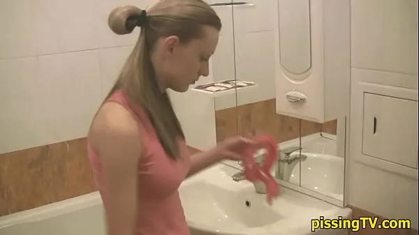 Hot Girl pisses sitting in the toilet cool Videos