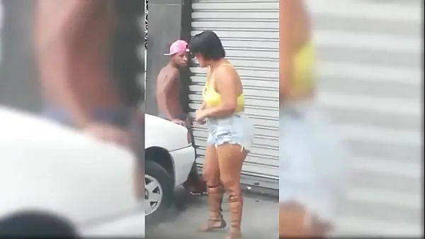 گرم carrying a pole in the street ٹھنڈے ویڈیوز