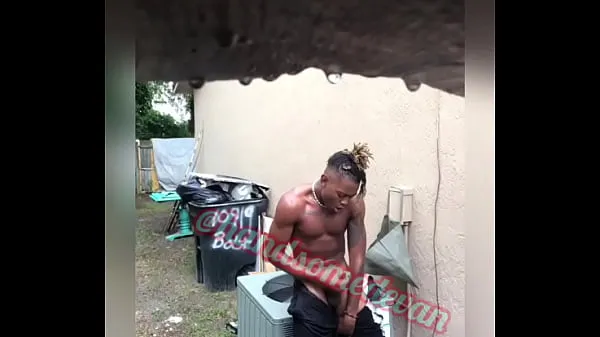 Hot Neighbors Watch young man jerk his dick in the rain (Handsomedevan cool Videos