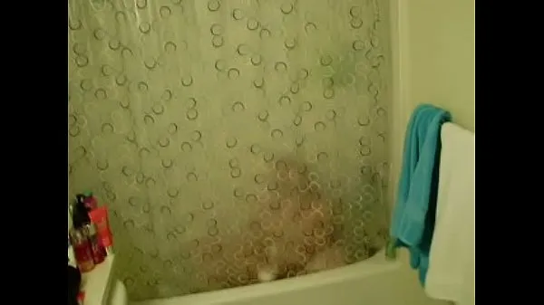 热Hidden cam from 2009 of wife masterbating in the shower酷视频
