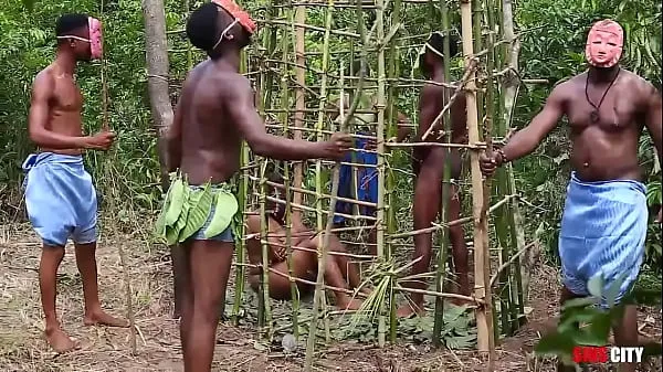 Somewhere in west Africa, on our annual festival, the king fucks the most beautiful maiden in the cage while his Queen and the guards are watching Video thú vị hấp dẫn