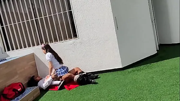 热Young schoolboys have sex on the school terrace and are caught on a security camera酷视频